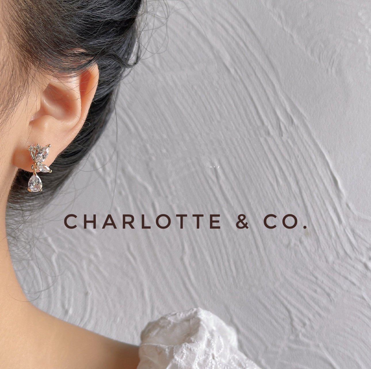 韓系吊水晶半蝶耳環