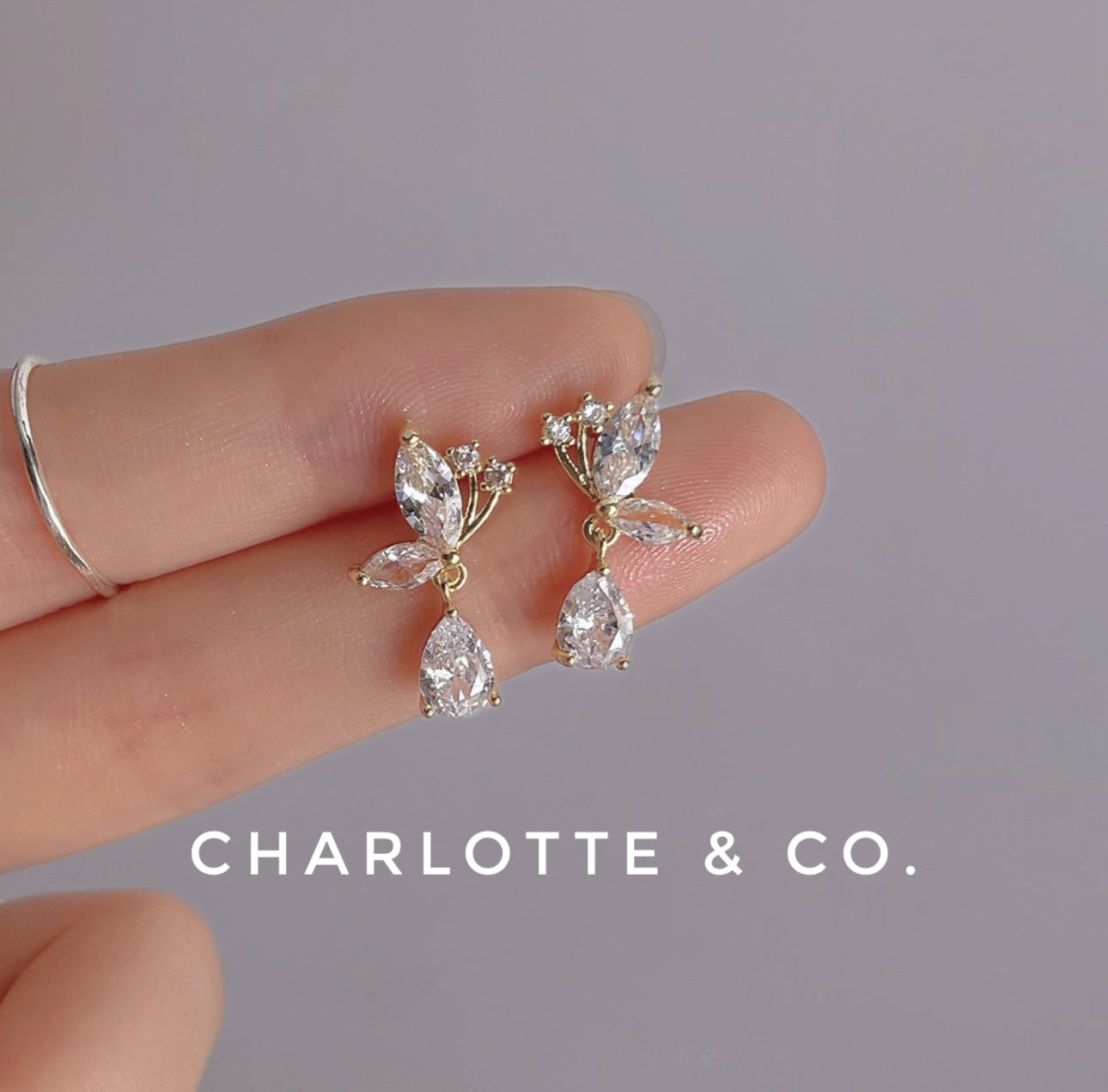 韓系吊水晶半蝶耳環